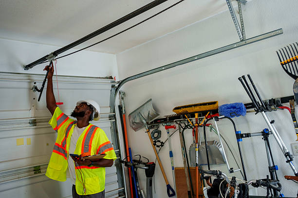 Professional Garage Door Panel Replacement technician working in Elkhart, KS